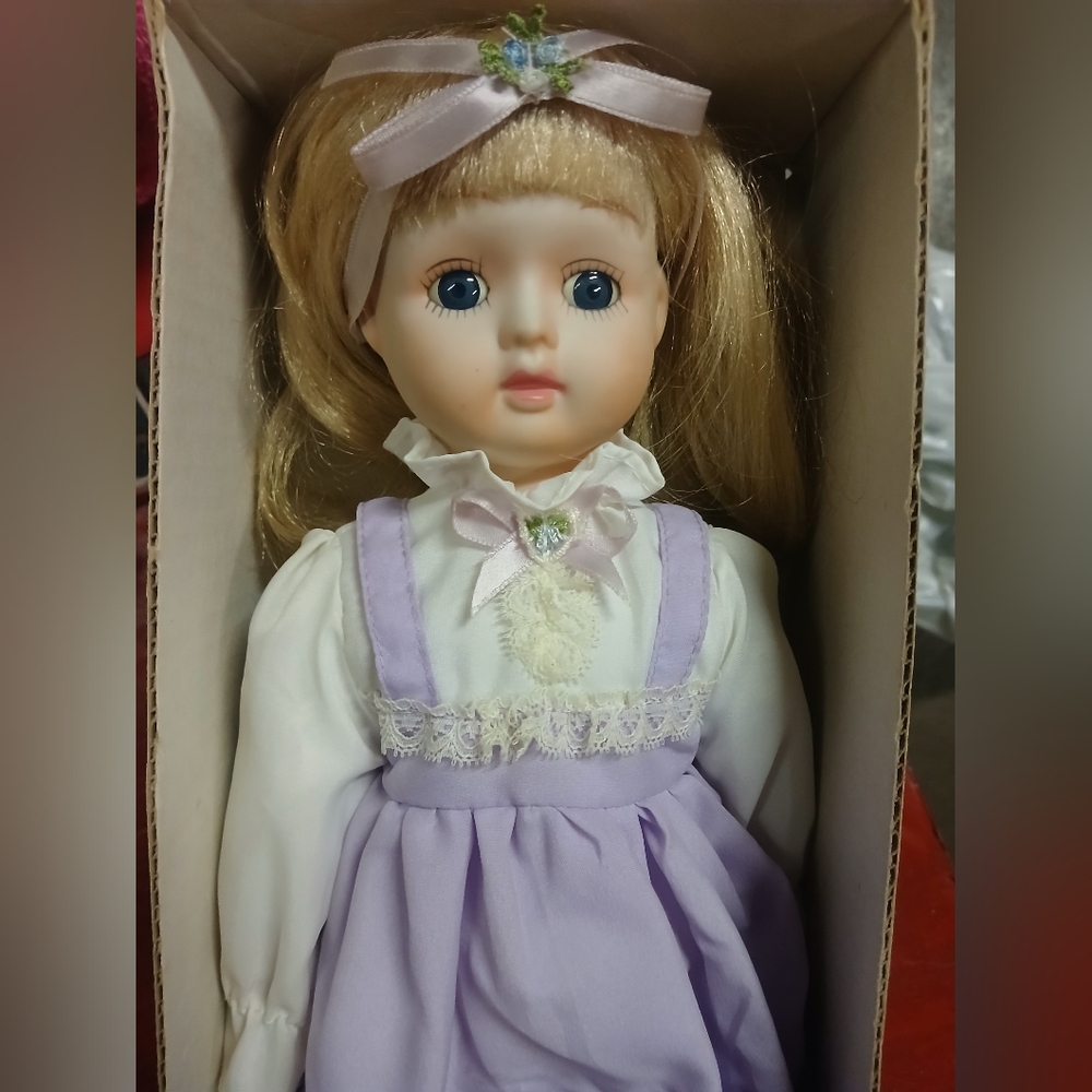 1986 Brinn's Porcelain Classic Blonde Doll with Lavender Dress That Plays Music